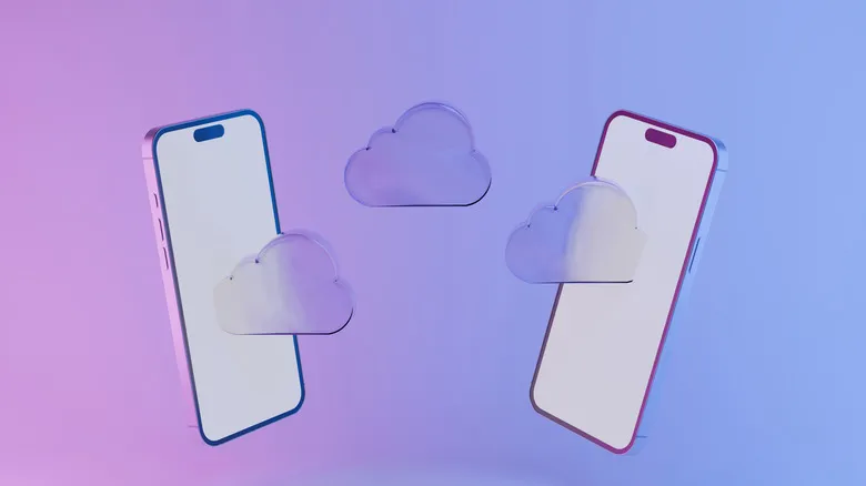 Concept image of two phones with floating cloud icons between them, symbolizing data transfer